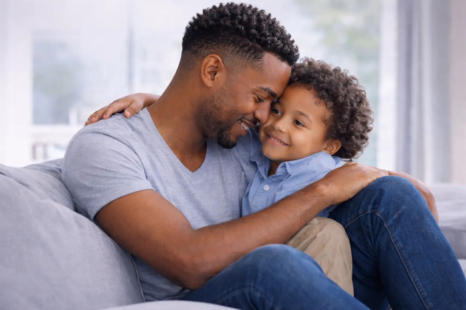 Father and child hugging, representing paternity DNA testing
