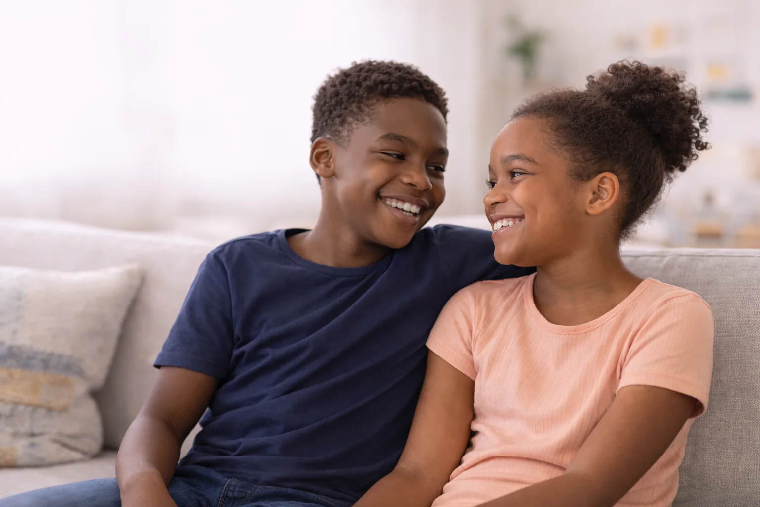 Two children together, representing siblingship DNA testing