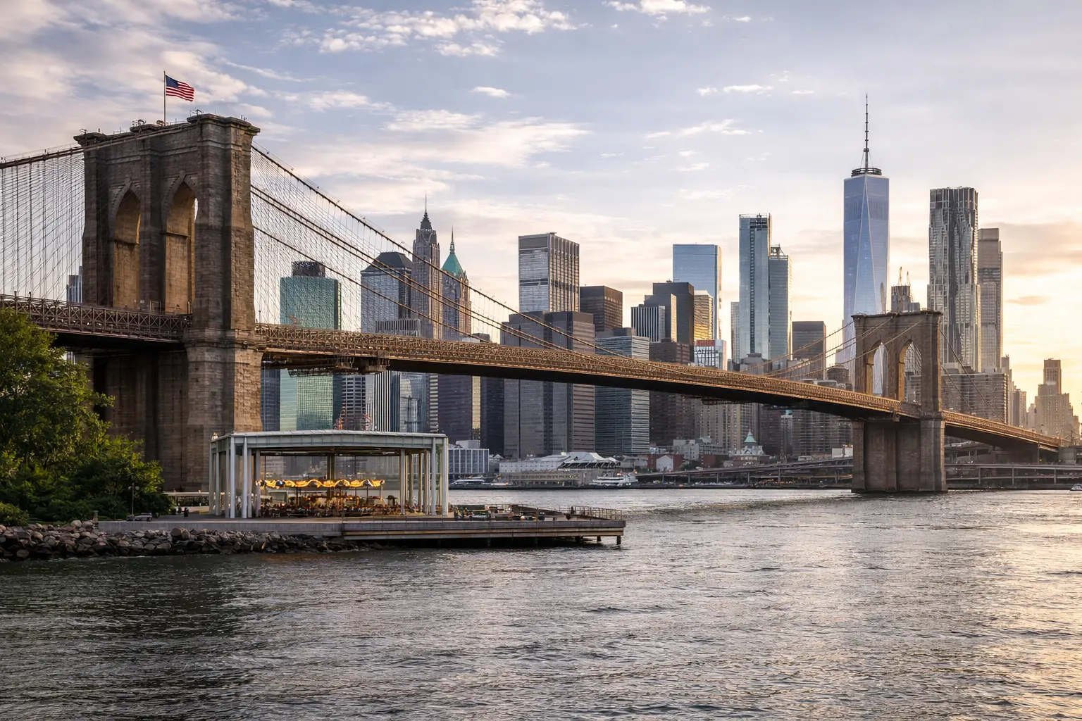 The Brooklyn Bridge spanning the East River with the Manhattan skyline in the background